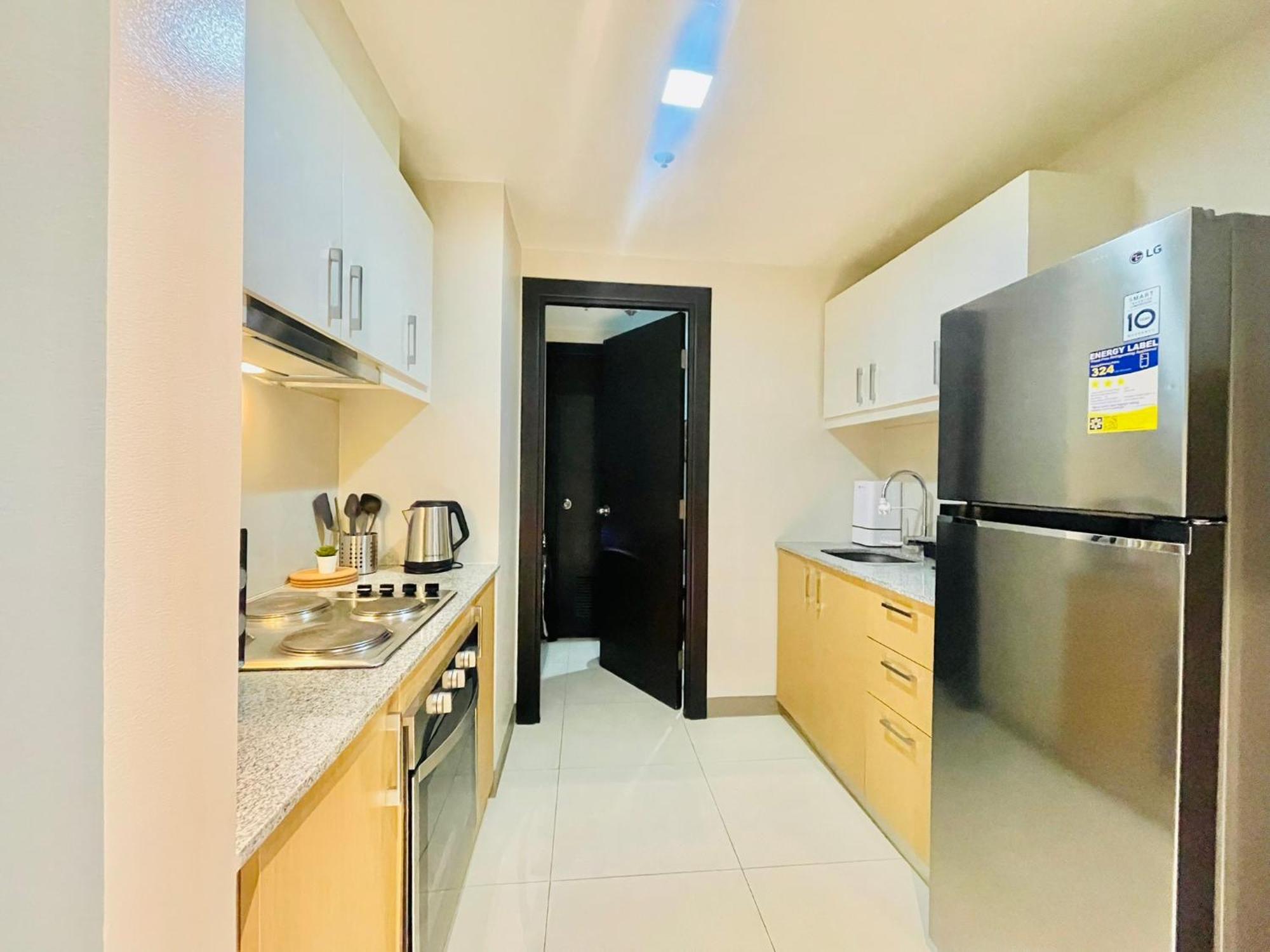 Uptown Parksuites Bgc ตากิก ภายนอก รูปภาพ