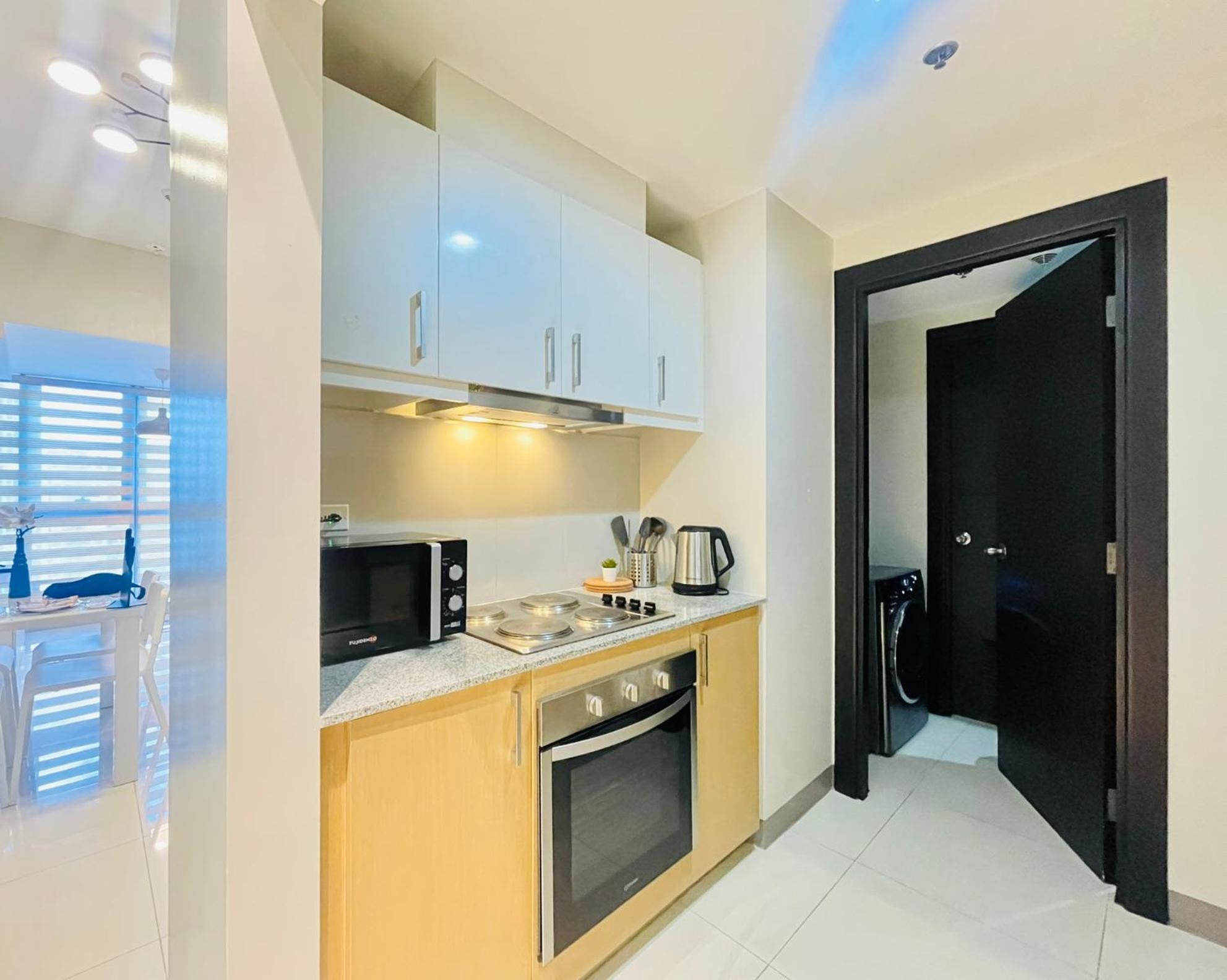 Uptown Parksuites Bgc ตากิก ภายนอก รูปภาพ